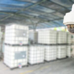 CCTV system security in warehouse of factory chemical blur background.